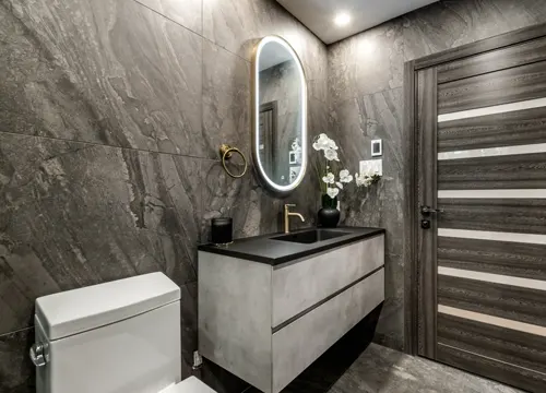 An in-progress bathroom remodel, showing the transformation process led by JH Midland Builder.