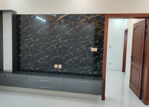 Designing and constructing a media wall, showing the planning and execution by JH Midland Builder.