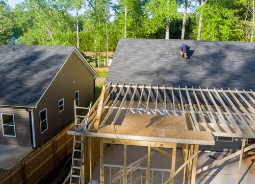 A newly installed roof providing excellent protection and aesthetic appeal, completed by JH Midland Builder.